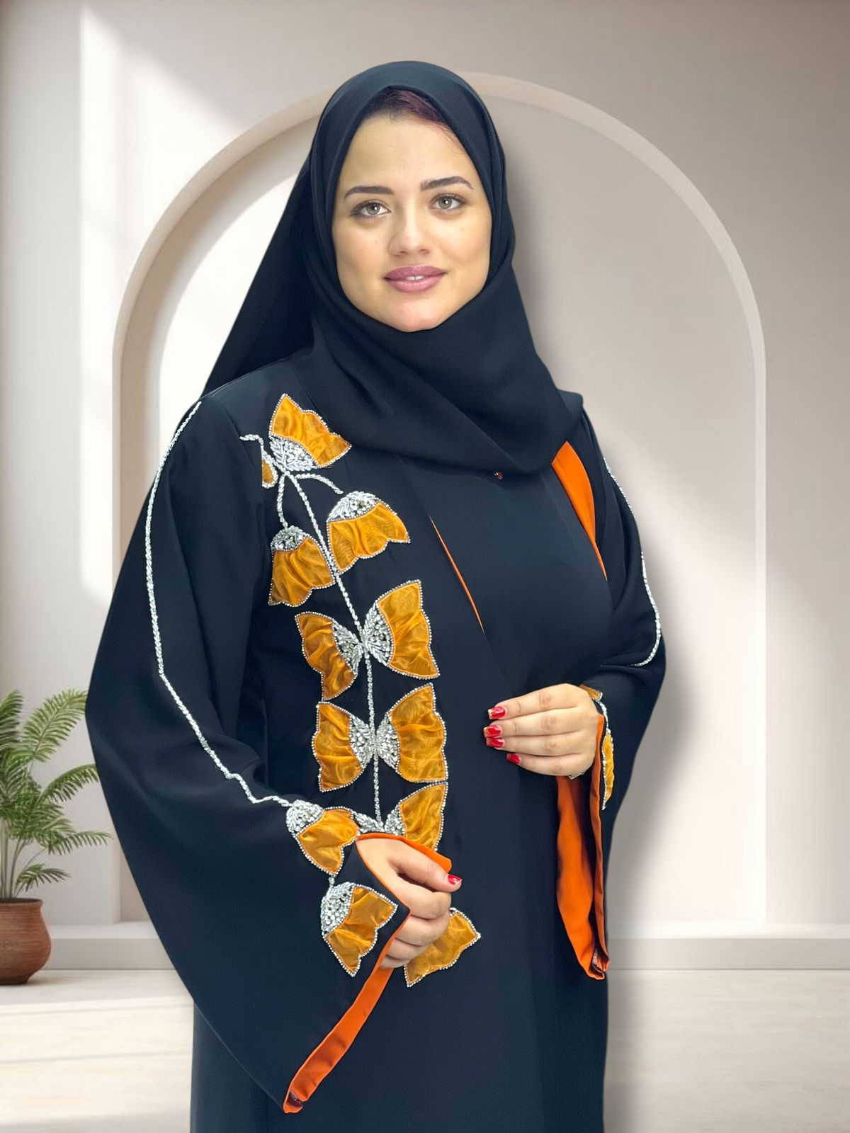 Orange embroidered abaya by La Perle