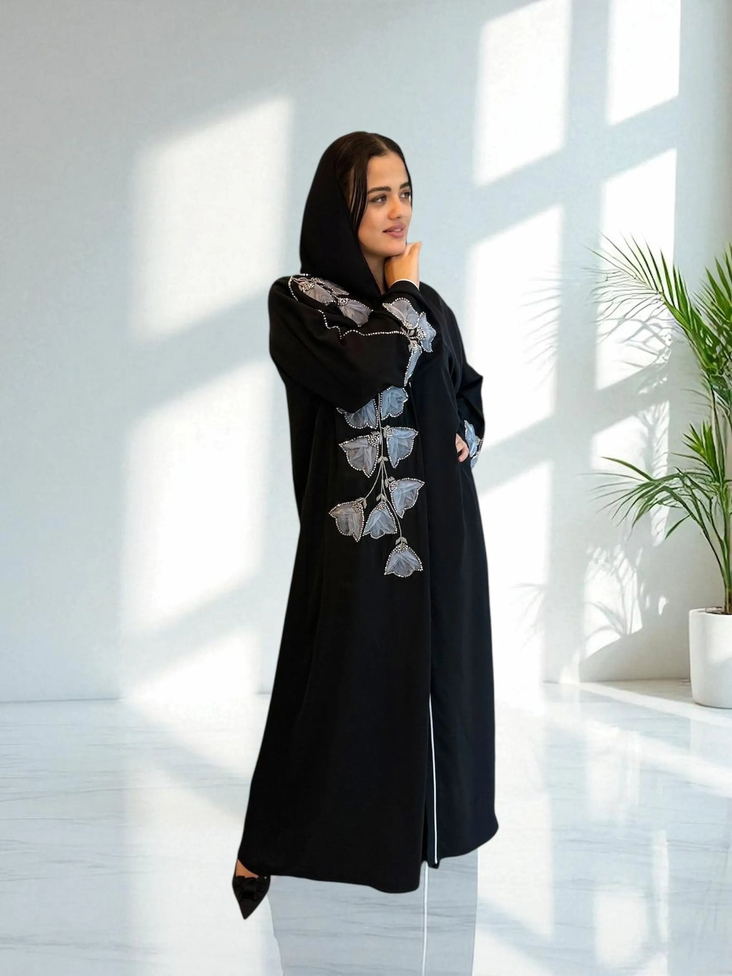 عباية ندا سوداء بتطريز أوراق يدوي | Black abaya with handmade organza leaf embroidery