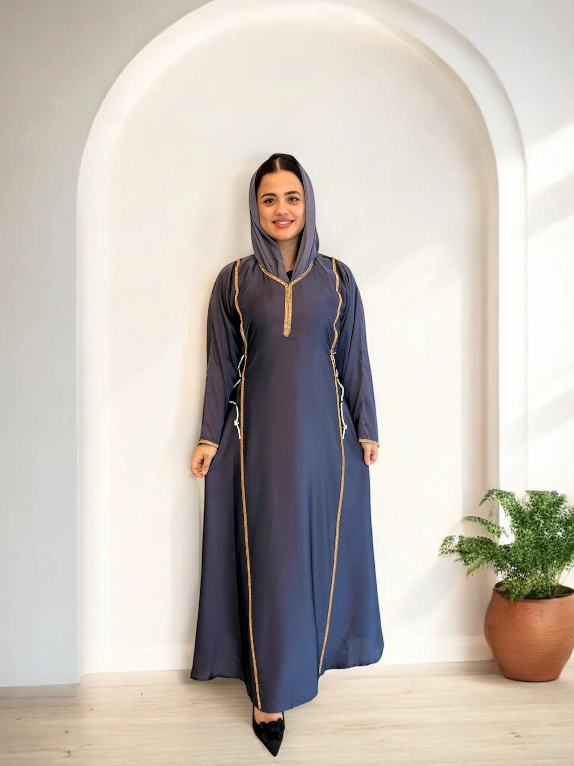 عباية ساتان مزينة بخطوط تطريز ذهبية | Satin abaya with golden embroidery lines